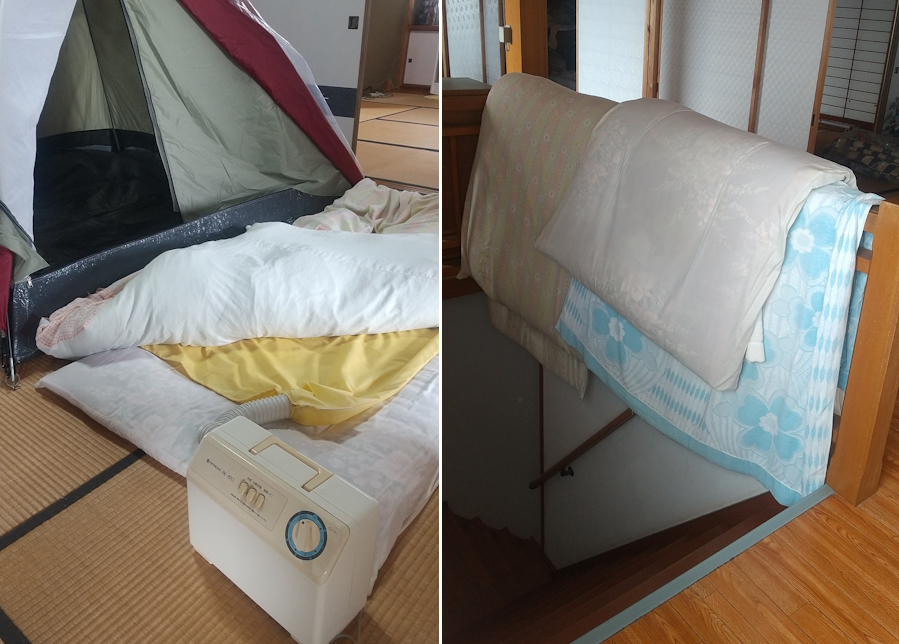 布団乾燥機にかけている　欄干に布団をかけている写真